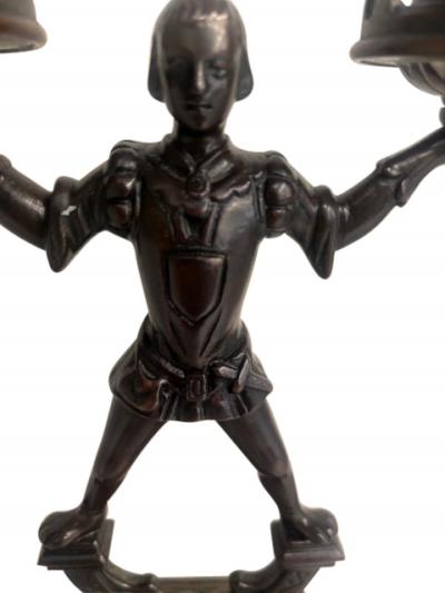 Pair of English 2 arm candlesticks held by a Renaissance style figure