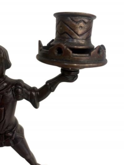 Pair of English 2 arm candlesticks held by a Renaissance style figure