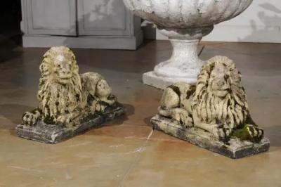 Pair of English 20th Century Composition Reclining Lion Sculptures with Patina