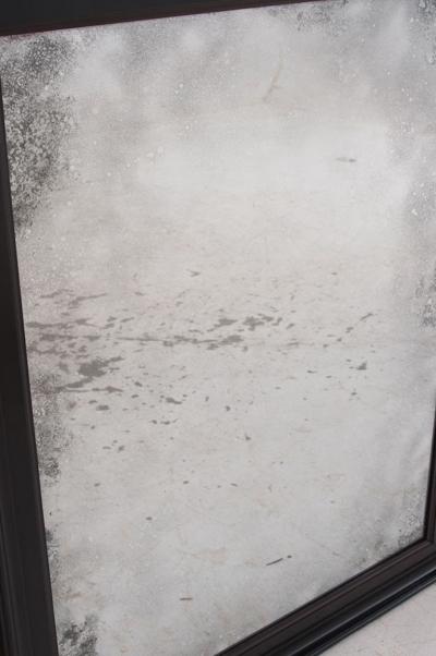 Pair of English 20th Century Ebonized Mirrors