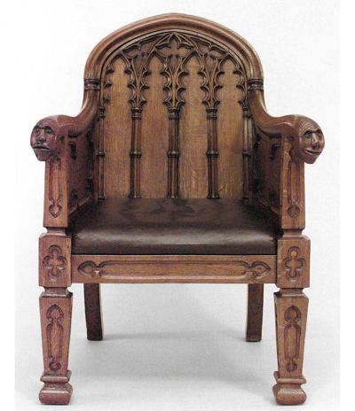 Pair of English Gothic Revival 19th Century oak carved club chairs
