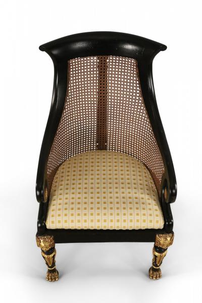 Pair of English Regency Style Carved Black and Giltwood Cane Back Armchairs