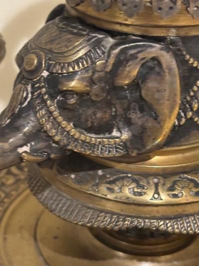 Pair of English Regency bronze candlesticks with 2 elephant heads arms