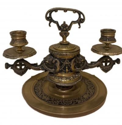 Pair of English Regency bronze candlesticks with 2 elephant heads arms