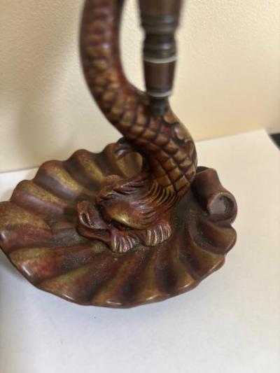 Pair of English Regency dolphin candlesticks