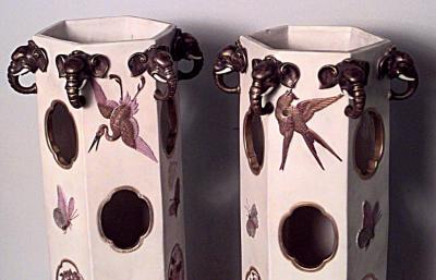 Pair of English Regency style 19th Cent hexagonal shaped vases with elephant h