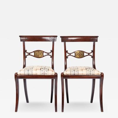 Pair of English Regency upholstered slip seat side chairs 1815