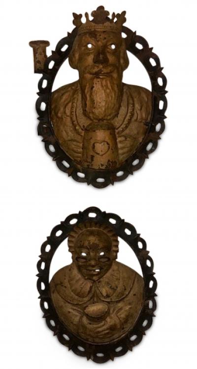 Pair of English Renaissance style metal wall plaques of king and lady