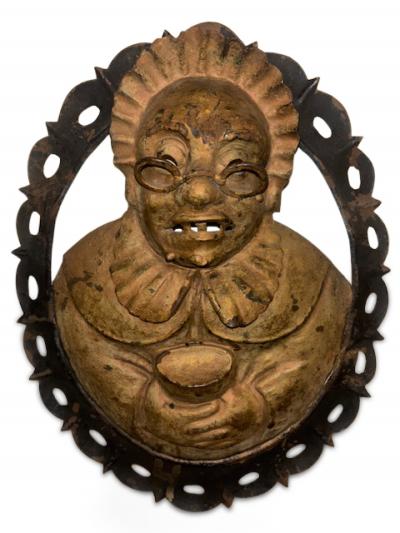 Pair of English Renaissance style metal wall plaques of king and lady
