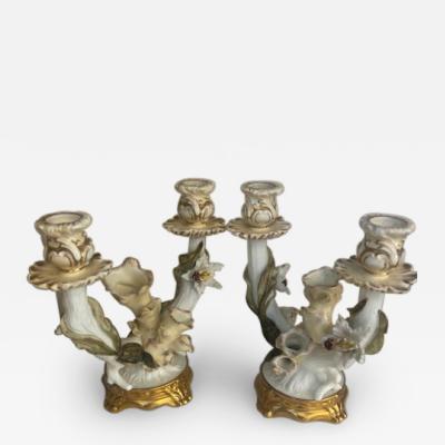 Pair of English Victorian 2 arm Moore porcelain candelabra with a floral design