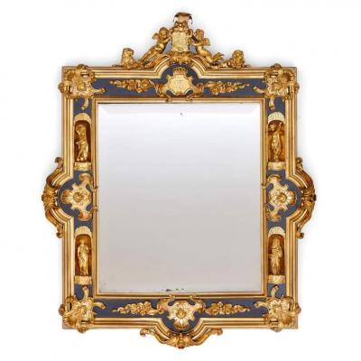 Pair of English gilt bronze and ebonised wood mirrors