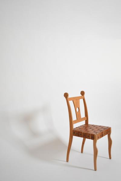 Pair of Etruscan oak and leather chairs 1970s 