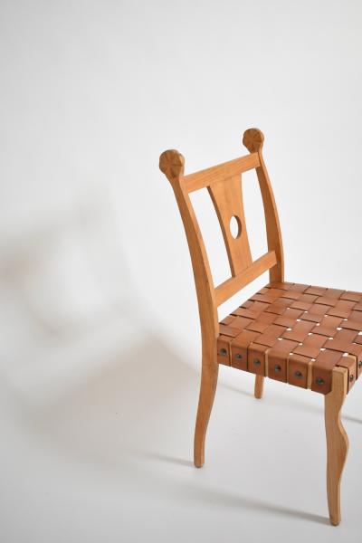 Pair of Etruscan oak and leather chairs 1970s 