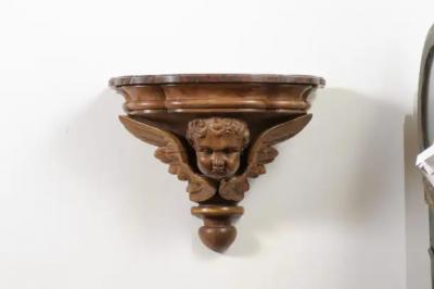Pair of French 1880s Carved Walnut Brackets with Cherubs and Faux Marble Tops