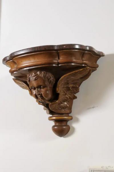 Pair of French 1880s Carved Walnut Brackets with Cherubs and Faux Marble Tops