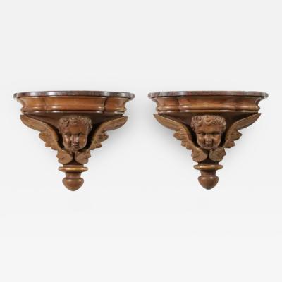 Pair of French 1880s Carved Walnut Brackets with Cherubs and Faux Marble Tops