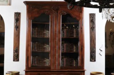Pair of French 1890s Carved Wooden Panels with Ribbon Tied Bouquets and Urns