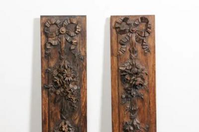 Pair of French 1890s Carved Wooden Panels with Ribbon Tied Bouquets and Urns