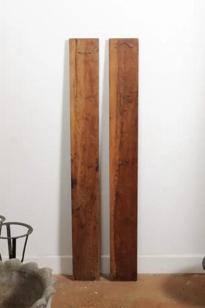Pair of French 1890s Carved Wooden Panels with Ribbon Tied Bouquets and Urns