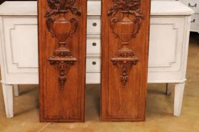 Pair of French 19th Century Carved Oak Vertical Panels with Bouquets in Vases