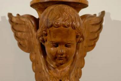 Pair of French 19th Century Wooden Wall Brackets with Carved Cherubs