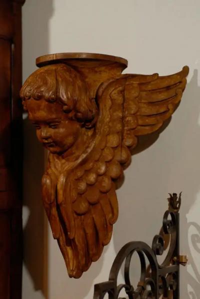 Pair of French 19th Century Wooden Wall Brackets with Carved Cherubs
