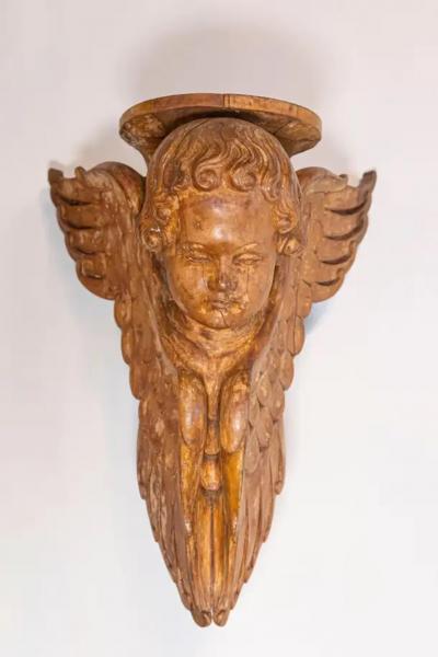 Pair of French 19th Century Wooden Wall Brackets with Carved Cherubs