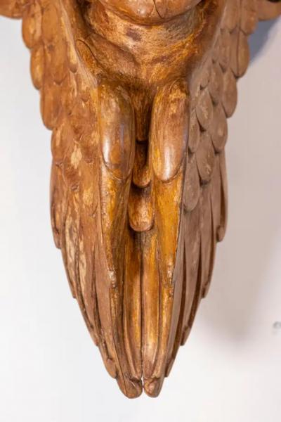 Pair of French 19th Century Wooden Wall Brackets with Carved Cherubs