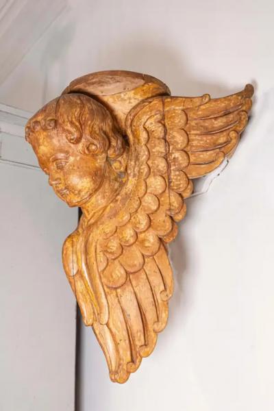 Pair of French 19th Century Wooden Wall Brackets with Carved Cherubs