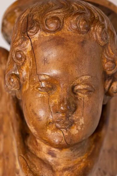 Pair of French 19th Century Wooden Wall Brackets with Carved Cherubs