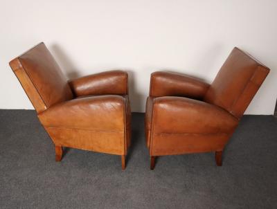 Pair of French Art Deco Leather Angled Back Club Chairs with Nailhead Decoration