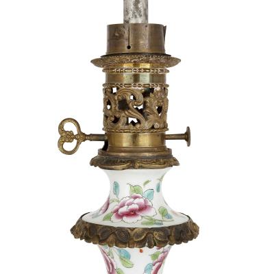 Pair of French Chinoiserie style gilt bronze mounted porcelain oil lamps