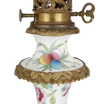 Pair of French Chinoiserie style gilt bronze mounted porcelain oil lamps