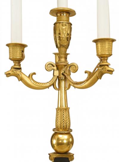Pair of French Empire Black and Gilt Candelabras with Bird Figures