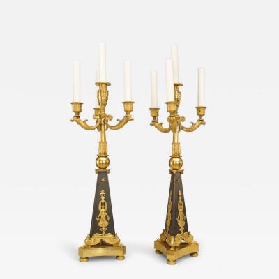 Pair of French Empire Black and Gilt Candelabras with Bird Figures