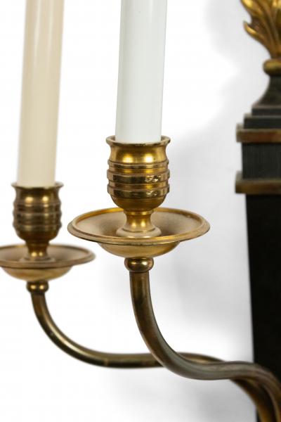 Pair of French Empire Ebonized Gilt Wall Sconces