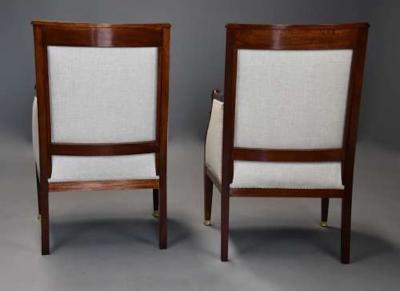 Pair of French Empire style mahogany upholstered armchairs