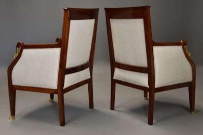Pair of French Empire style mahogany upholstered armchairs