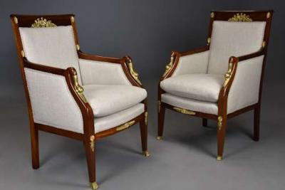 Pair of French Empire style mahogany upholstered armchairs