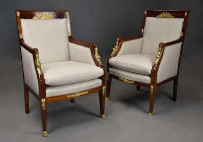 Pair of French Empire style mahogany upholstered armchairs