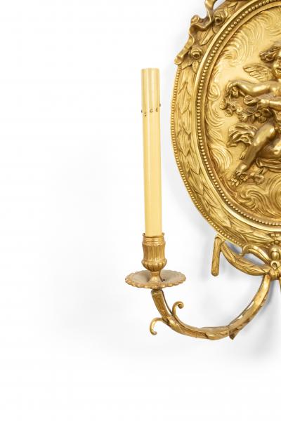 Pair of French Louis XV Style Bronze Dore Cupid Wall Sconces