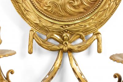 Pair of French Louis XV Style Bronze Dore Cupid Wall Sconces