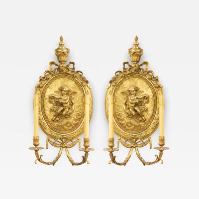 Pair of French Louis XV Style Bronze Dore Cupid Wall Sconces