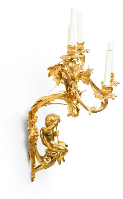 Pair of French Louis XV Style Bronze Dore Cupid Wall Sconces