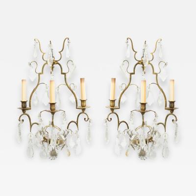 Pair of French Louis XV Style Bronze and Crystal Wall Sconces