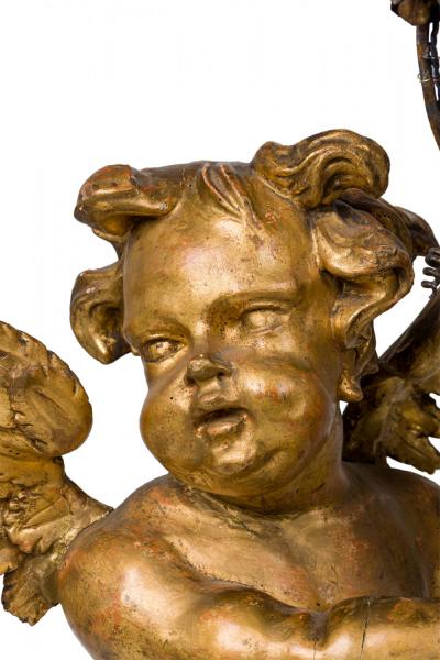 Pair of French Louis XV Style Gilt Cherub Torchieres