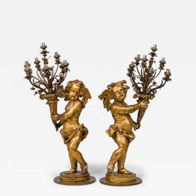 Pair of French Louis XV Style Gilt Cherub Torchieres
