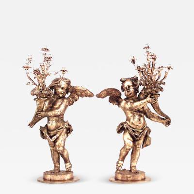 Pair of French Louis XV Style Gilt Wood Cherub Floor Torchieres