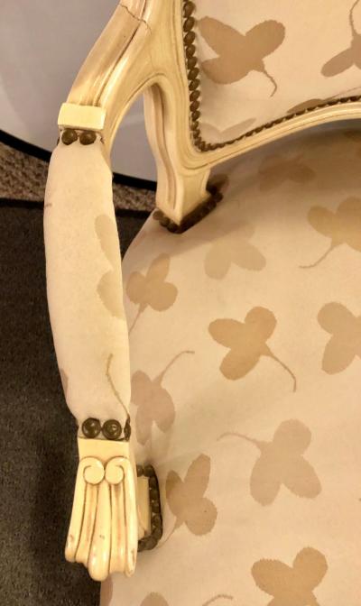 Pair of French Louis XV Style Parcel Gilt and Paint Decorated Bergere Chairs