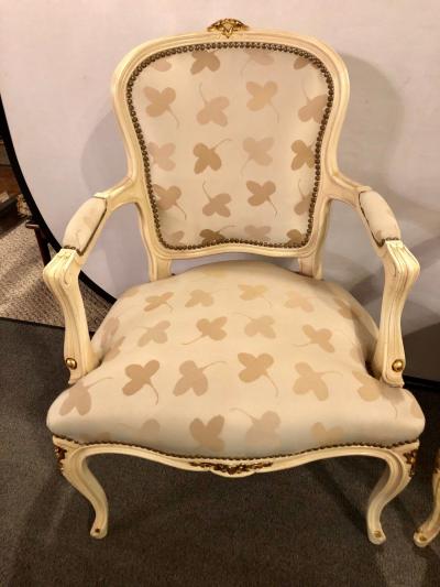 Pair of French Louis XV Style Parcel Gilt and Paint Decorated Bergere Chairs